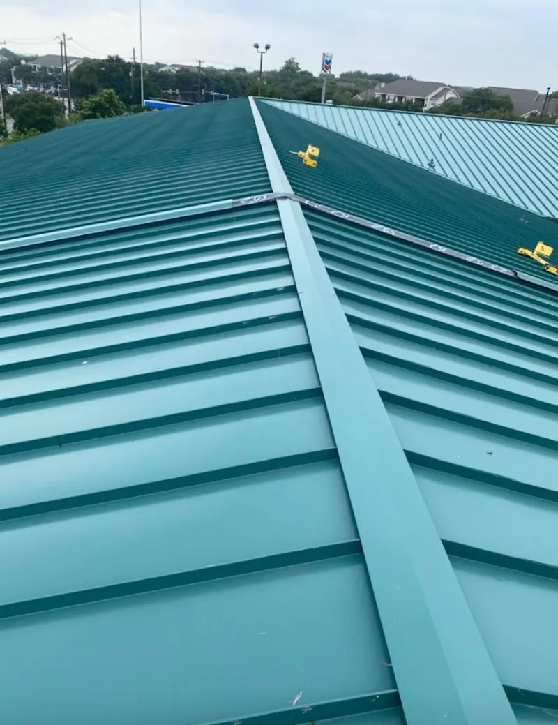 Green commercial metal roof ridge and valley for Metal Roof Repair in Knightdale