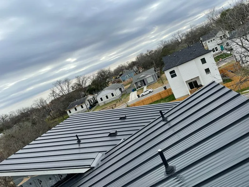 Standing seam metal roof panels with vents for Skylight Repair in Knightdale